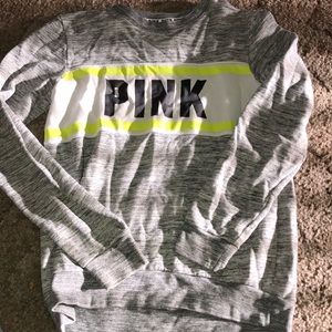A  pink Victoria’s Secret crewneck